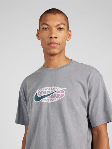 T-Shirt 'SWOOSH' Nike Sportswear en gris