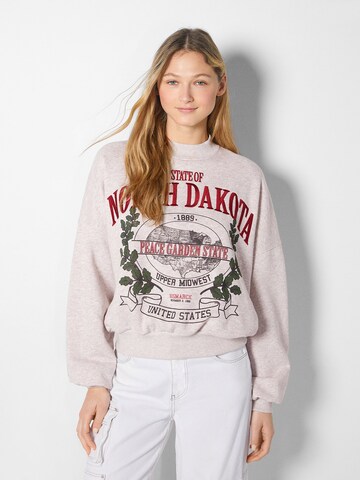 Sweat-shirt Bershka en beige : devant