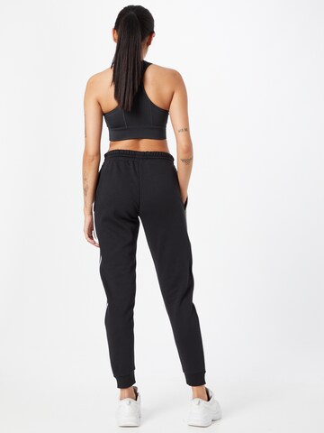 Reebok Tapered Sportbroek in Zwart