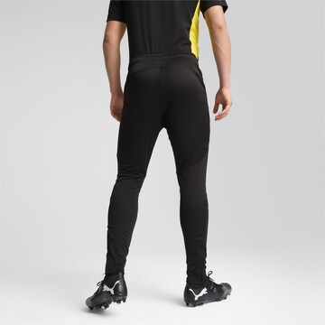 PUMA Slim fit Sports trousers in Black