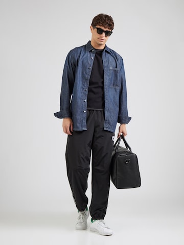 Calvin Klein Jeans - Tapered Pantalón en negro