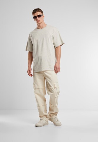 Karl Kani Autograph Heavy Jersey Boxy Melange Tee ' ' in Beige