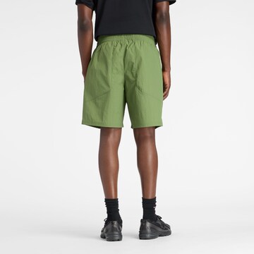 Regular Pantalon de sport 'Castlefield Woven Short 7"' new balance en vert