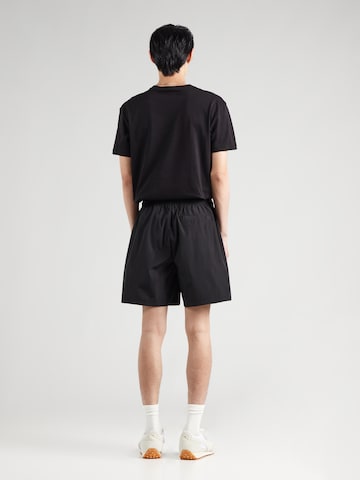 Calvin Klein JeansLoosefit Hlače - crna boja