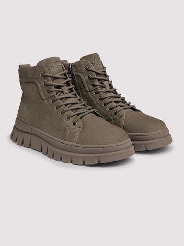 Ombre - Botas con cordones en verde