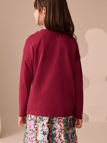 Tricou de la Next pe roșu