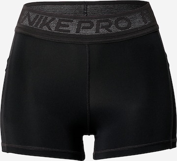 NIKE - Skinny Pantalón deportivo en negro: frente