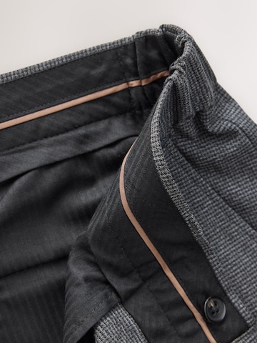 Slimfit Pantaloni con piega frontale di Next in blu