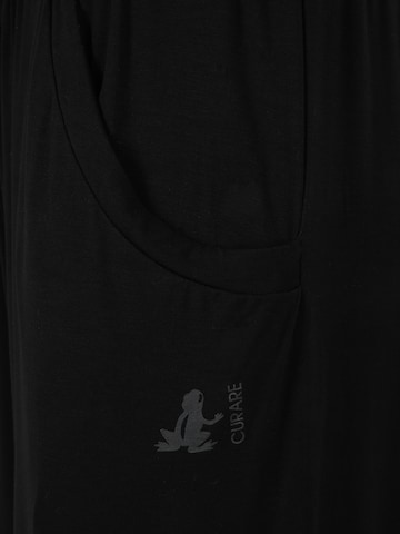 Tapered Pantaloni sportivi di CURARE Yogawear in nero