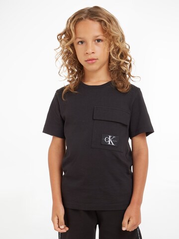 T-Shirt Calvin Klein Jeans en noir : devant