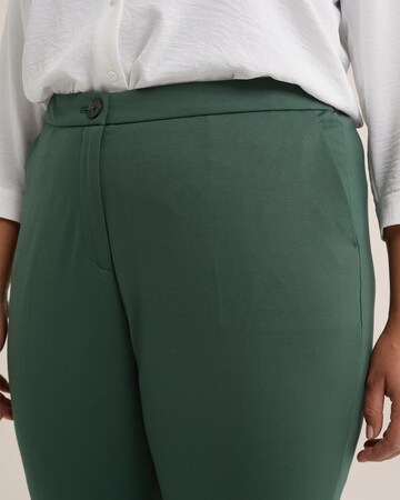 Coupe slim Pantalon à plis WE Fashion en vert