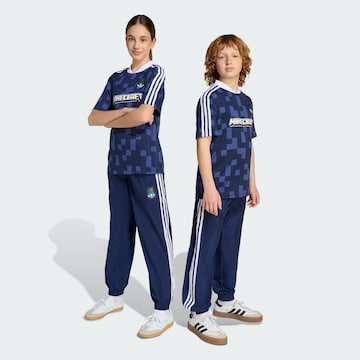 ADIDAS ORIGINALS Tapered Trousers 'Adidas Originals X Minecraft' in Blue: front