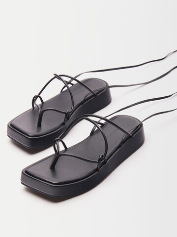 Bershka T-bar sandals in Black