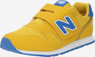 Sneaker '373' di new balance in giallo: frontale