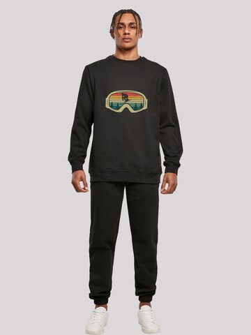 Sweat-shirt 'Retro Skibrille Wintersport' F4NT4STIC en noir