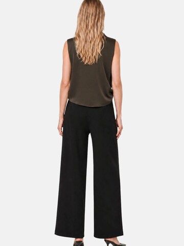 Millibar Blus i brun