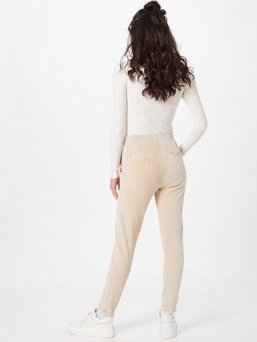 TOM TAILOR Tapered Trousers in Beige