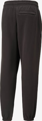 PUMA - Tapered Pantalón en negro