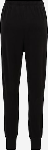 Reebok - Tapered Pantalón deportivo en negro