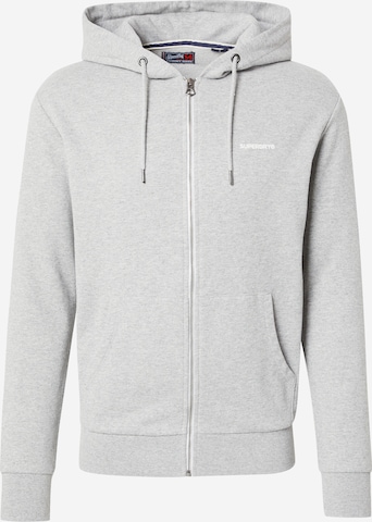 Veste de survêtement Superdry en gris : devant