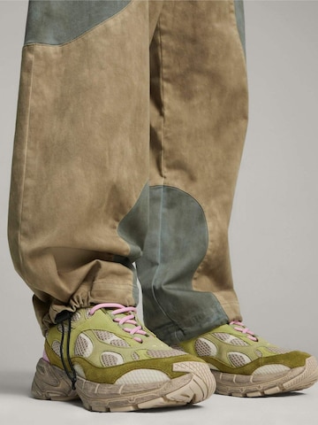 PUMA - regular Pantalón deportivo 'Puma X Kidsuper Track Pants' en beige