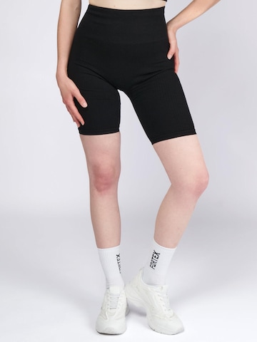 Skinny Leggings 'Essential Seamless Shorts' Fortex Fitness en noir : devant