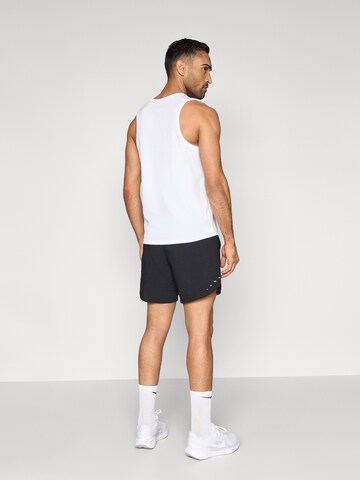 NIKE Loosefit Παντελόνι φόρμας σε μαύρο