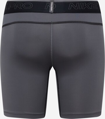 NIKE - Skinny Cueca desportiva em cinzento