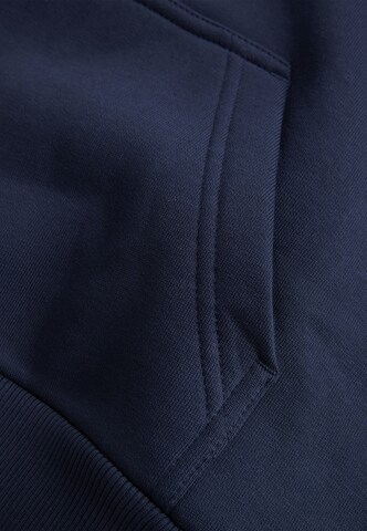 PEAK PERFORMANCE Kapuzensweatshirt W Original Hood in Blau