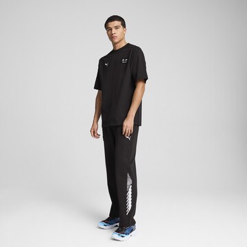 PUMA Functioneel shirt 'Neon Energy' in Zwart