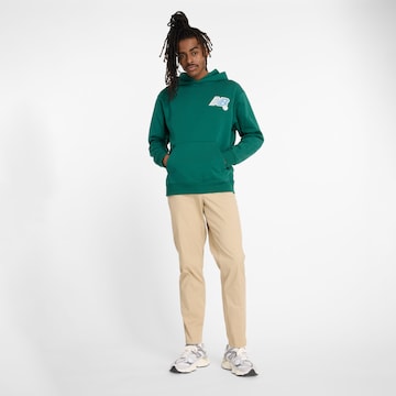 Regular Pantalon chino 'Athletics Standard Tapered' new balance en beige