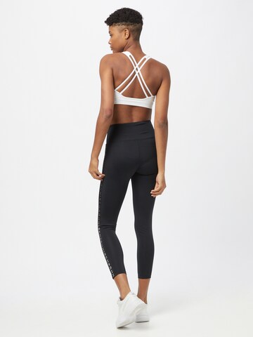 Skinny Pantalon de sport 'KAY' Röhnisch en noir