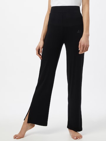 CURARE Yogawear Свободный крой Спортивные штаны в Черный: спереди