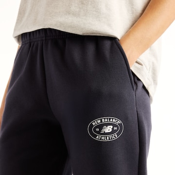 new balance - Flared Calças 'Reimagined Fleece Pant' em preto