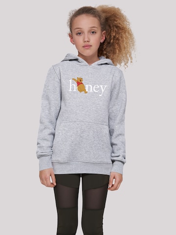 F4NT4STIC Sweatshirt 'Disney Winnie The Pooh Honey' in Grijs: voorkant