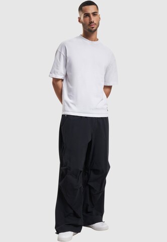 Karl Kani Loose fit Pants in Black