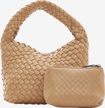 Borsa a mano di Usha in beige: frontale