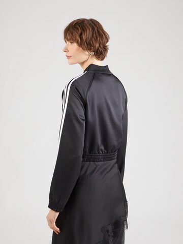 ADIDAS ORIGINALS - Casaco meia-estação 'SST' em preto