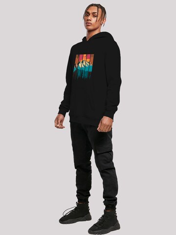 Sweat-shirt 'Berg Sonnenuntergang Retro' F4NT4STIC en noir