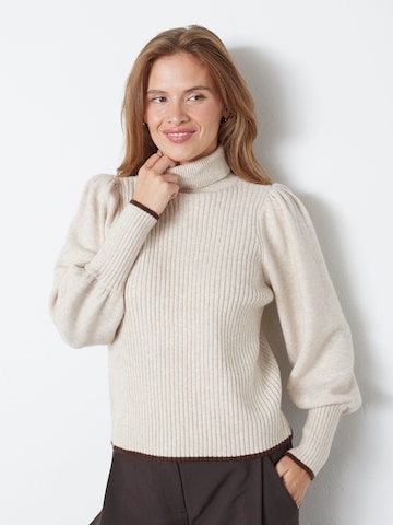 Pull-over 'Row' co'couture en beige : devant