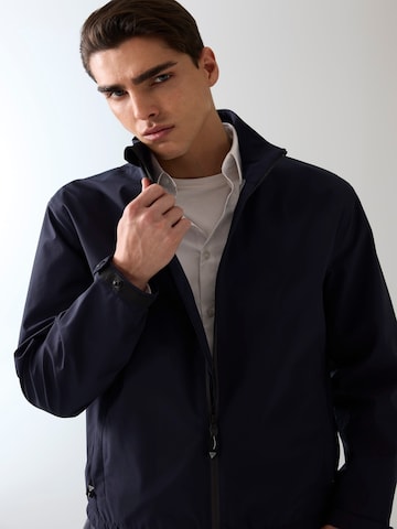 GUESS Performance Jacket in Blue