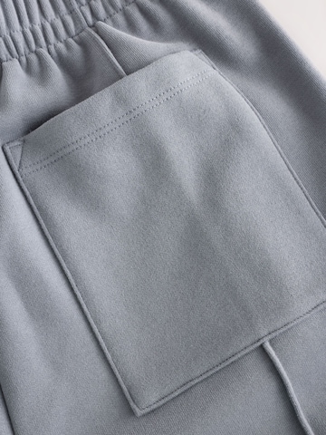 Wide leg Pantaloni sportivi di self. in grigio