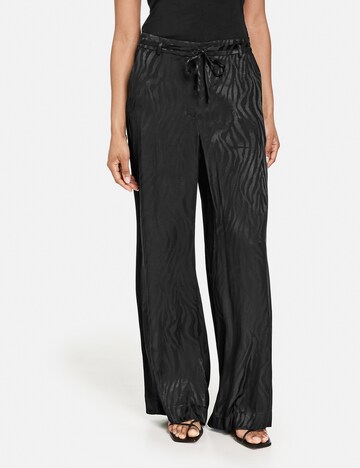 TAIFUN Loose fit Trousers in Black: front