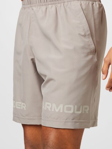 UNDER ARMOUR Regular Sports trousers in Beige