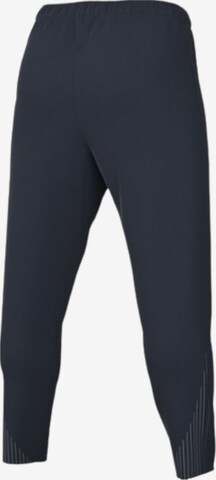 NIKE Slim fit Workout Pants in Blue