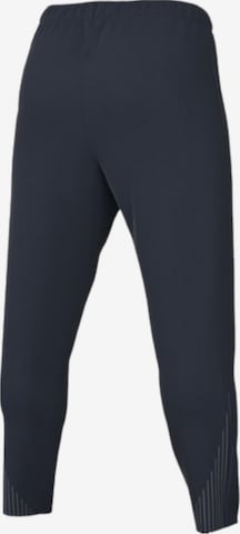 NIKE Slim fit Workout Pants in Blue