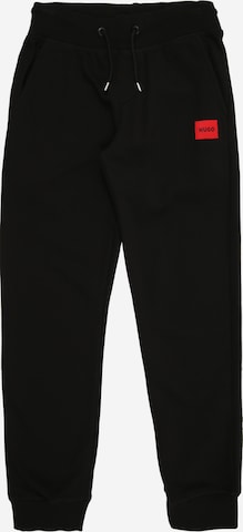 HUGO Tapered Housut värissä musta: etupuoli