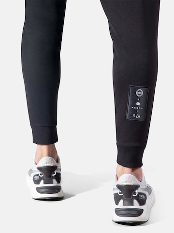 MOROTAI Slimfit Sporthose 'CORPORATE' in Schwarz
