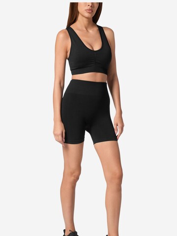 Skinny Pantaloni sportivi di Plein Sport in nero