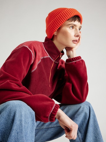 Pull-over iets frans en rouge